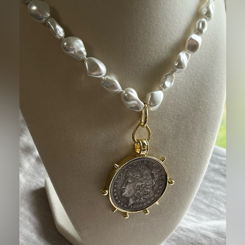 Coin pedant on pearl necklace